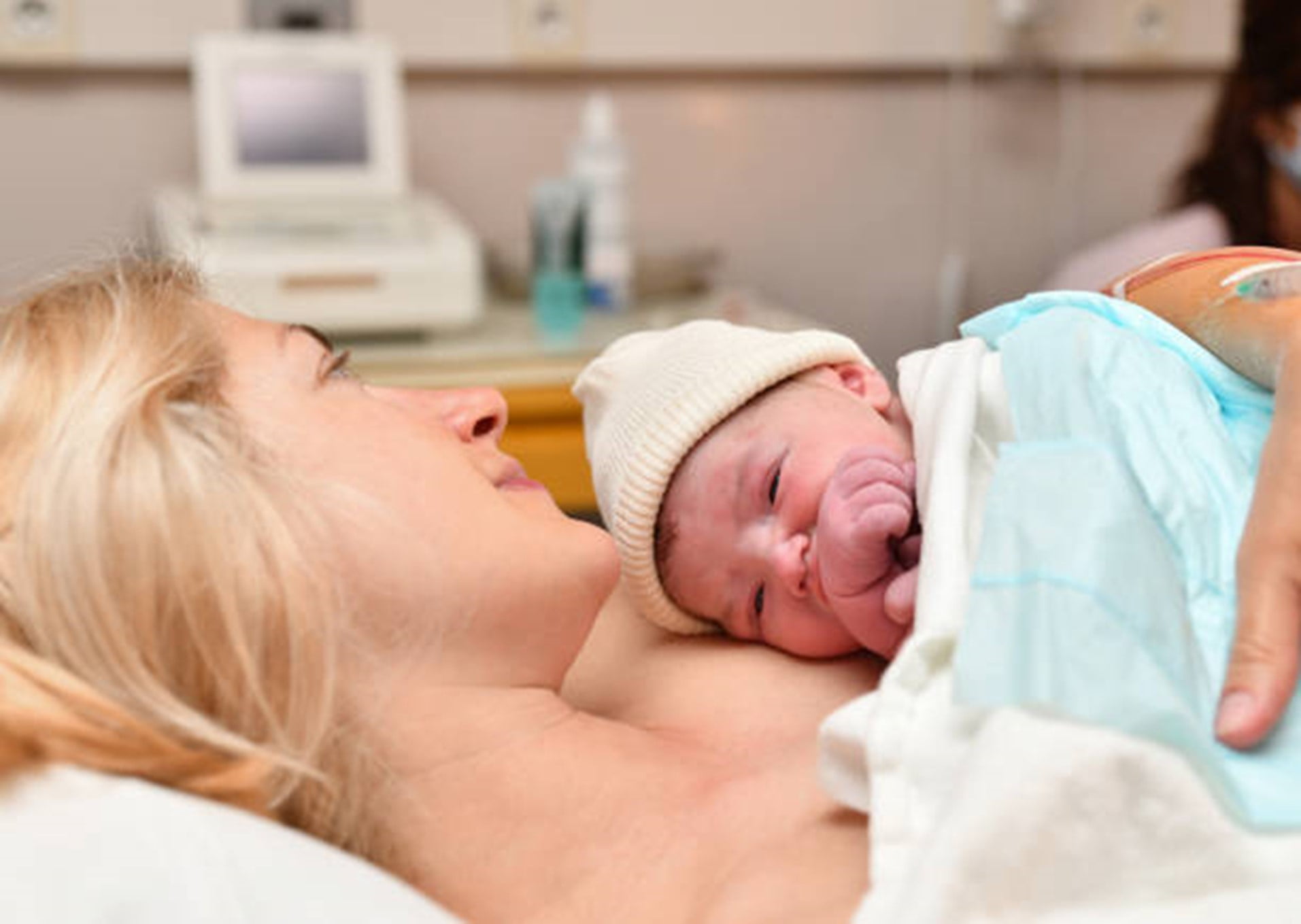 mother holding baby