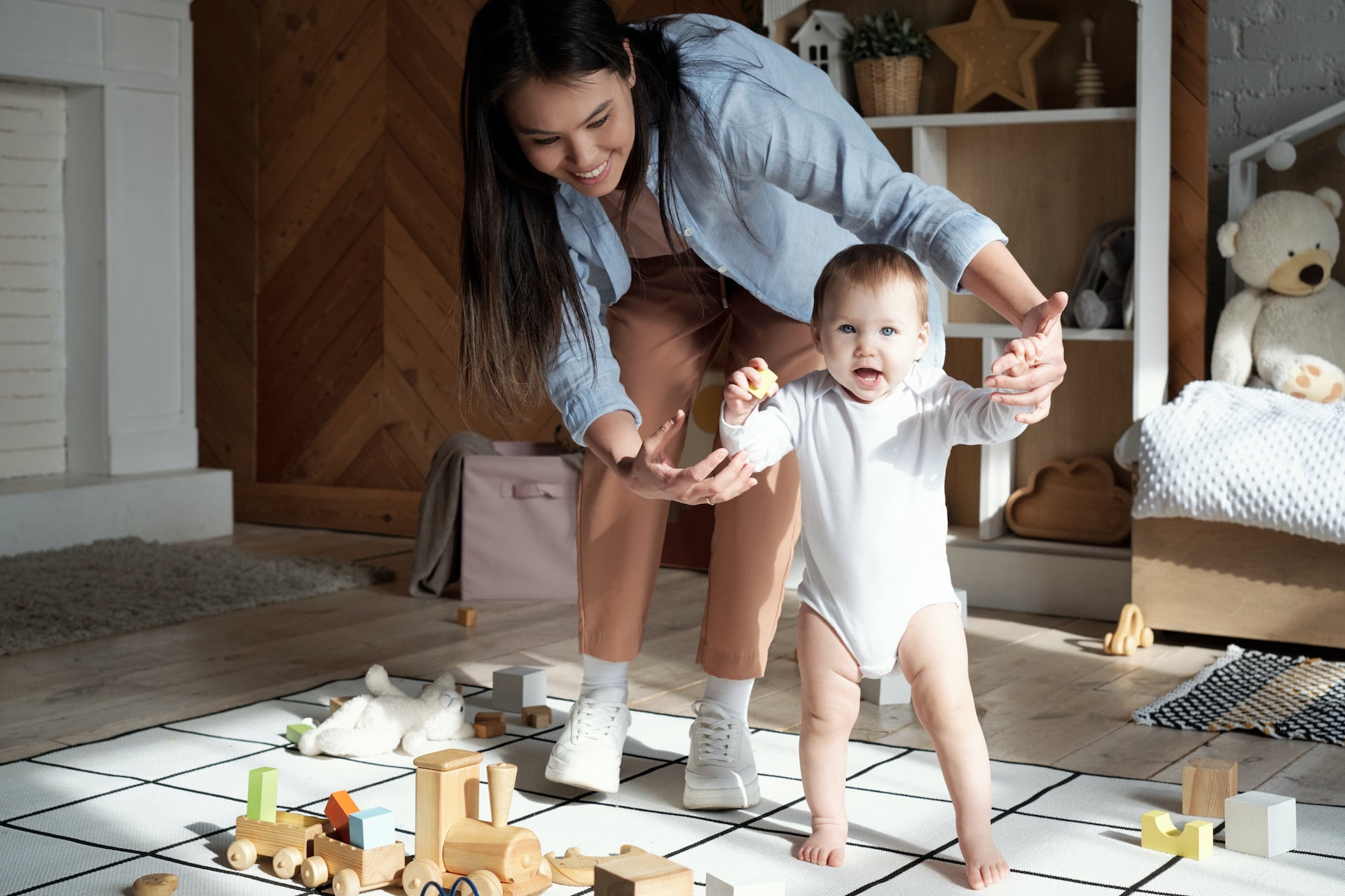 mother helping baby, motherhood